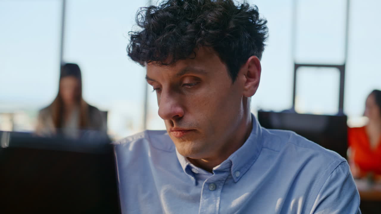 Company professional thinking project sitting workplace checking time closeup