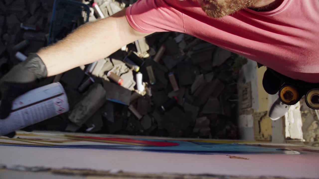 Graffiti artist painting with aerosol spray 4k