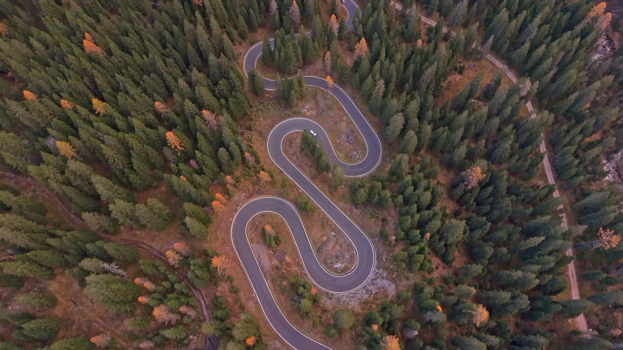 Autumn aerial of famous Snake Road in Dolomites mountains, Italy