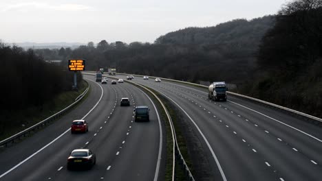 fast traffic on the highway near cardiff, wales with lots of cars and trucks passing by