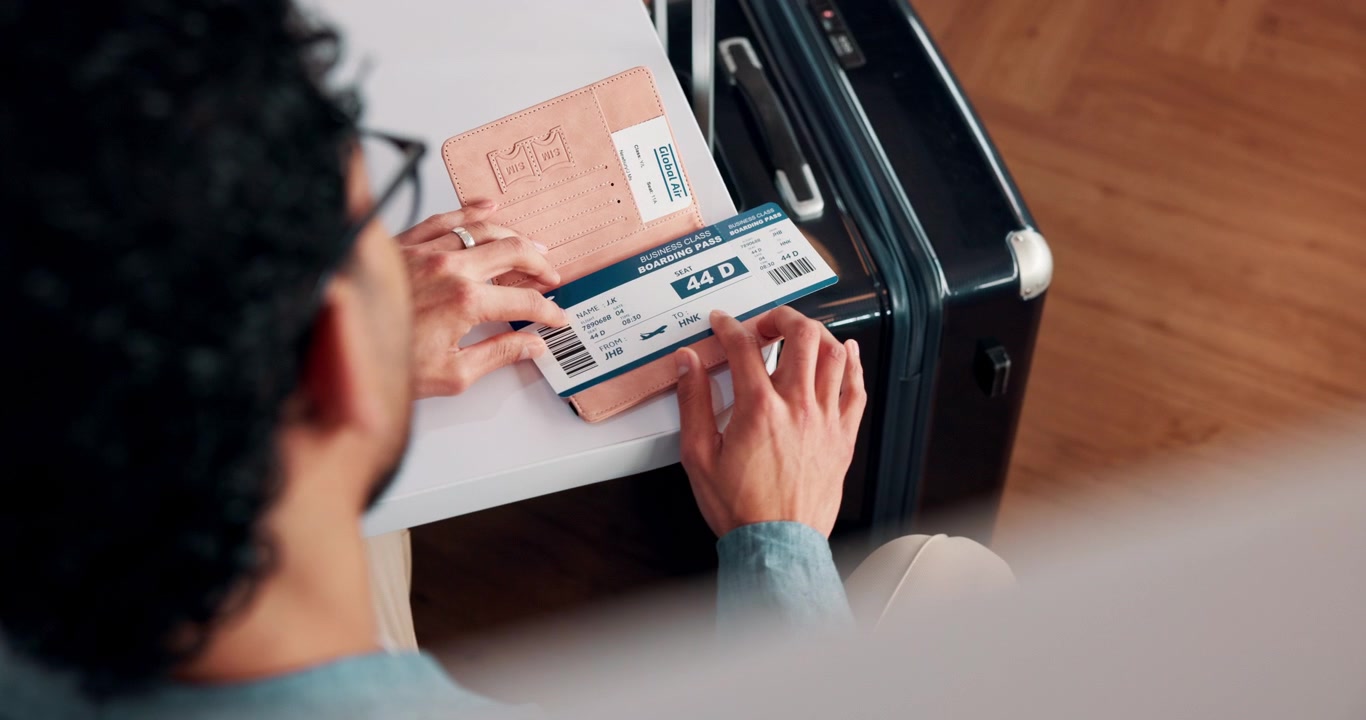 Traveler Checking Passport and Boarding Pass Before Flight