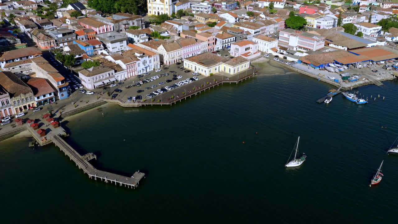Aerial view of marina with pier, small boats and waterfront buildings of Sao Francisco do Sul, Santa Catarina, Brazil