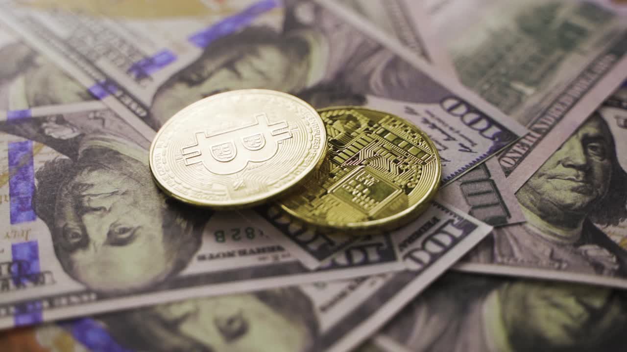Bitcoin and US dollars in slow motion.