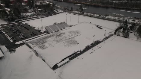 multi-purpose stadium of coulter field at bishop's university covered in snow during winter in lennoxville, quebec