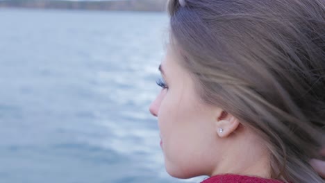 woman looking out at lake