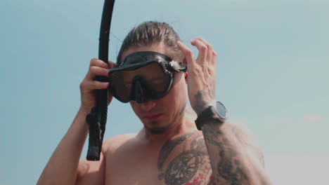 man wearing scuba diving goggles