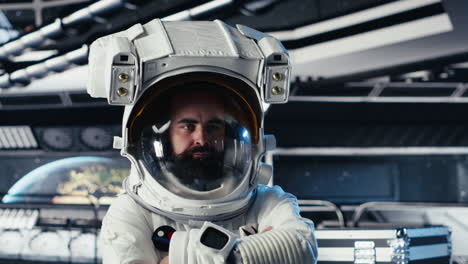 portrait of astronaut wearing helmet before stepping out of space station
