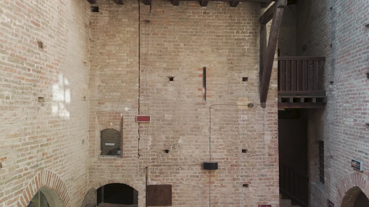 Grinzane Cavour castle, UNESCO site, Cuneo, Piedmont, Italy. 4k aerial view of the castle together with the Vineyard. Langhe-Roero and Monferrato. Ascending