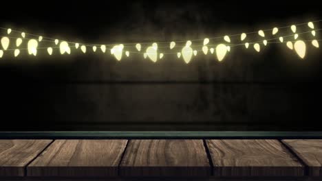 cadena brillante de luces de hadas en la pared de ladrillo