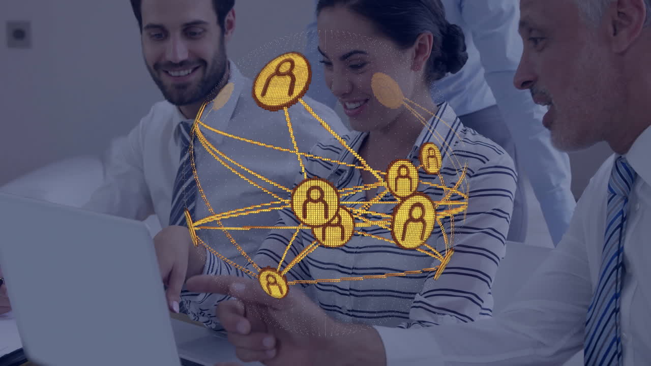 Group collaborating around laptop in business meeting, displaying holographic network visualization