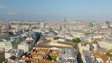 aerial sliding shot reveals beautiful viennese buildings on summer day