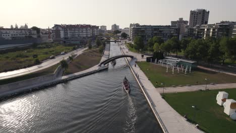 cityscape of aveiro with water canal and many bridges, aerial drone view