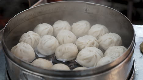 steaming hot chinese bao buns, sala bao, siopao, cha siu bao, banh bao