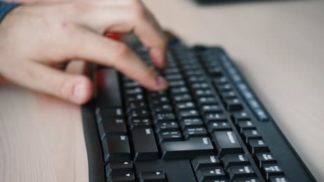 person typing on a keyboard