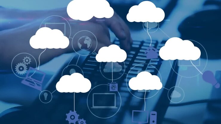 Animation of clouds with media icons and hands of businessman typing