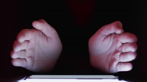 Video-of-caucasian-man's-hand-and-smartphone-with-blank-screen-on-black-background