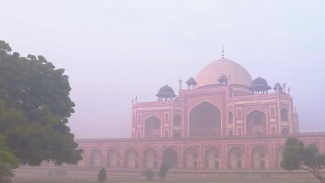 humayun tomb at misty morning from unique perspective shot is taken at delhi india