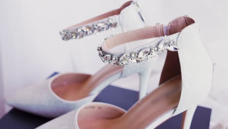 close up shot and side view of a bridal high heel shoes