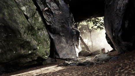 sunlight peeking through a rocky cave