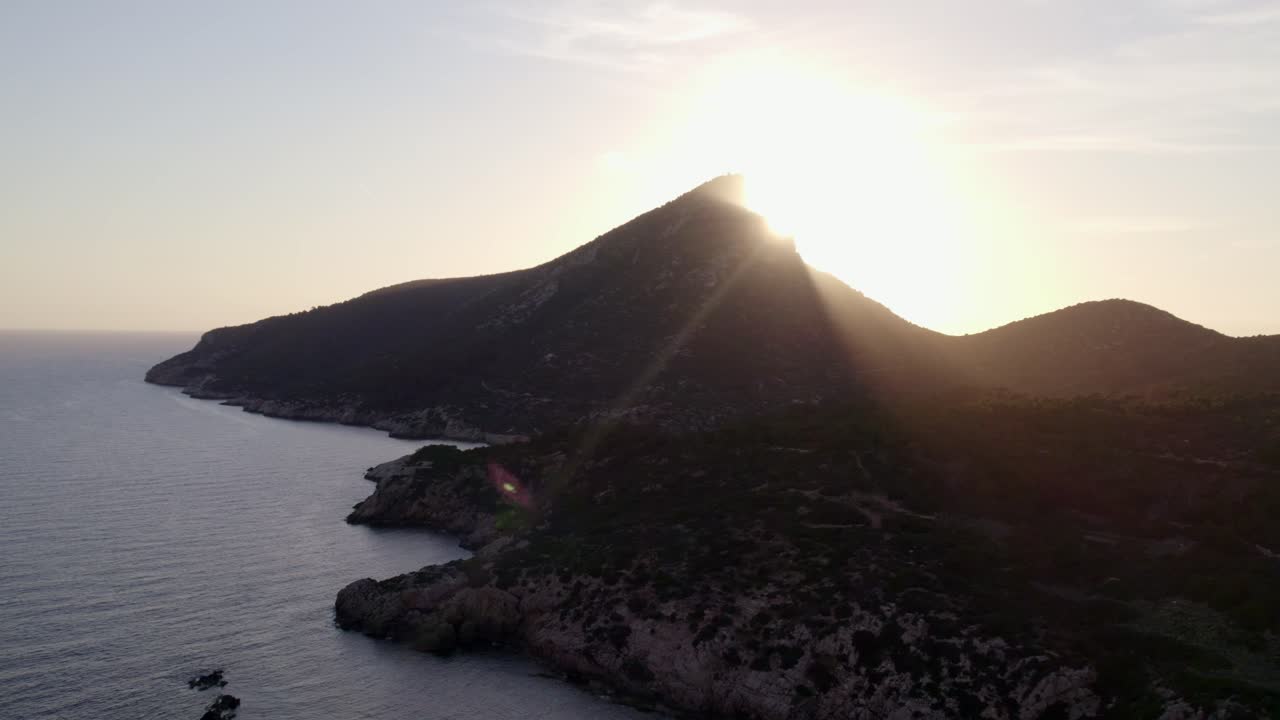 Farol costeiro ao pôr do sol, Dragonera, Ilhas Baleares, Espanha