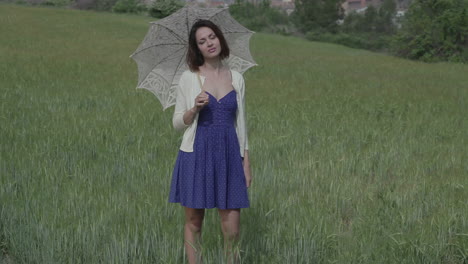 young woman outdoors in the countryside relaxing