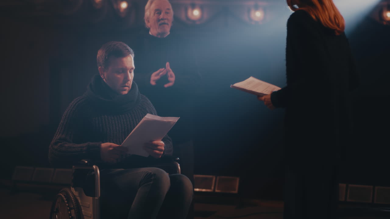 Diverse Actors Team Reading their Scripts during Theatre Drama Play Rehearsal Diverse Actors Team Reading their Scripts during Theatre Drama Play Rehearsal in Library Showing Dedication to Script Practice Role Preparation together for Dramatic Arts Reenactment Camera a