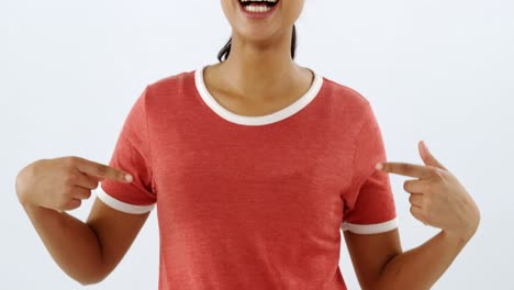 woman in red top standing against white background 4k