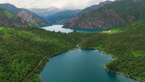 scenic travel destination in sary chelek lake kyrgyzstan central asia natural reservoir aerial drone footage