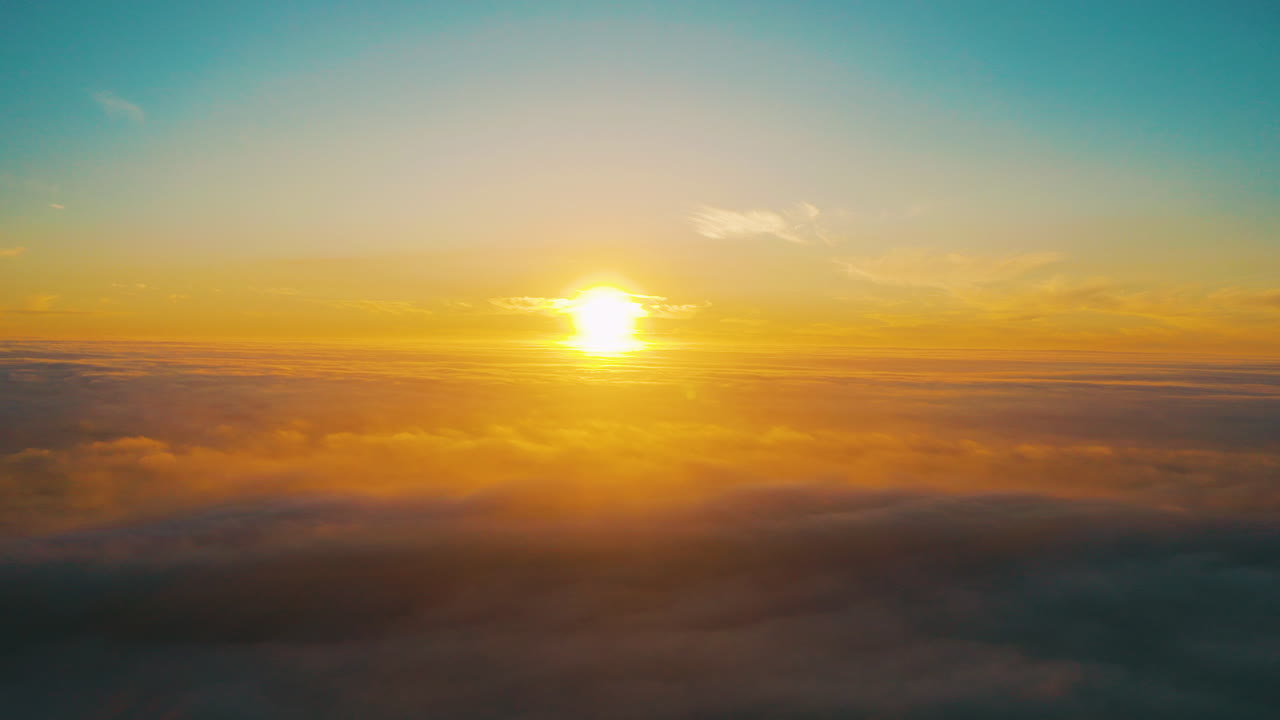 Sunrise or Sunset Above the Clouds