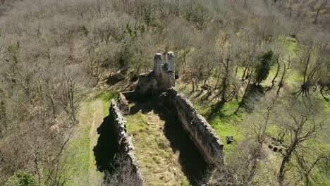 ruins of a tuscan church dating back to the middle ages, called the chiesaccia located in the ancient city of vitozza