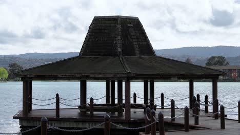 gazebo, lake and houses in an island