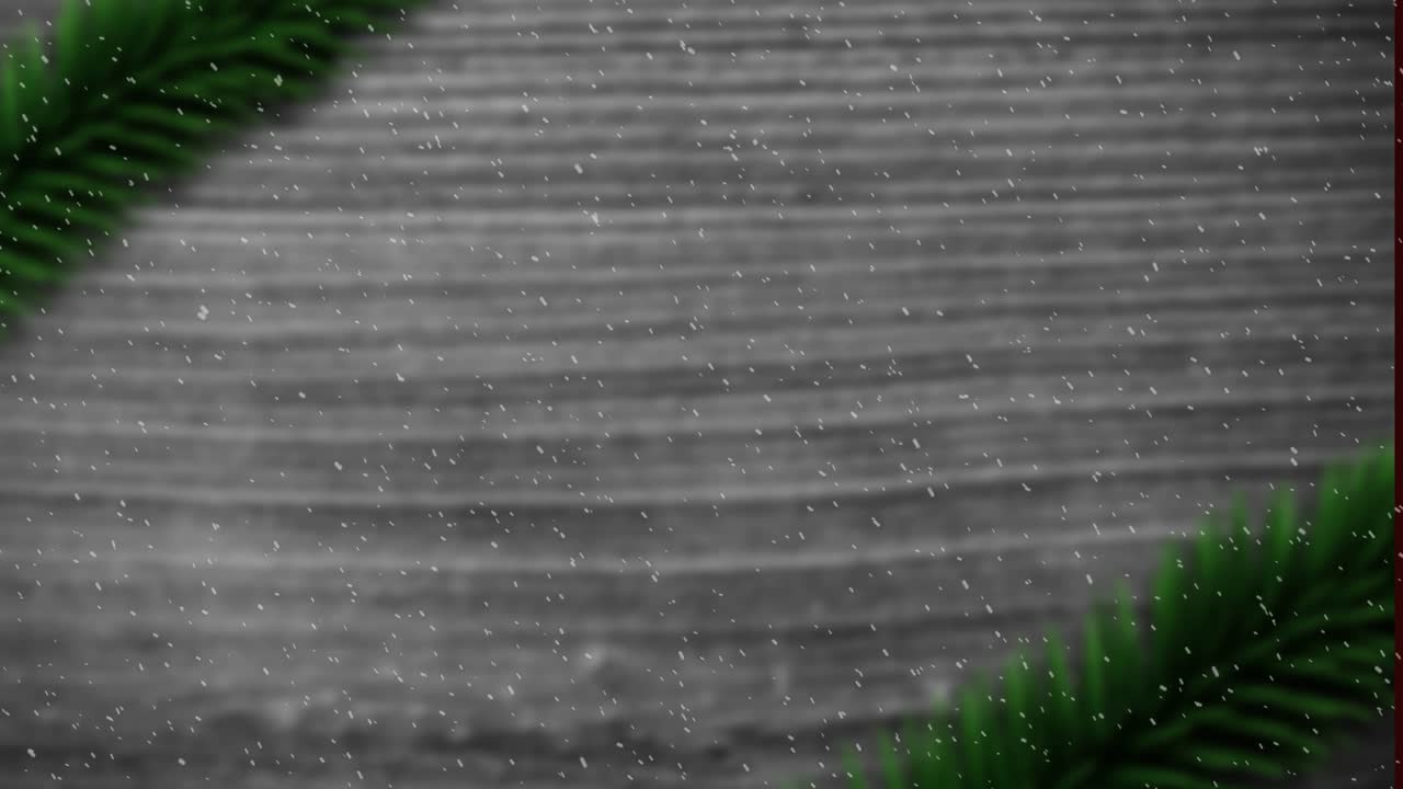 animación de nieve cayendo contra la decoración de la rama del árbol de navidad en madera