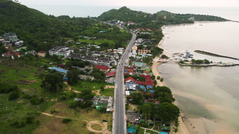 aerial view of maret, ko samui district, surat thani, thailand south east asia travel destination for digital nomad drone footage of scenic coastline at sunset