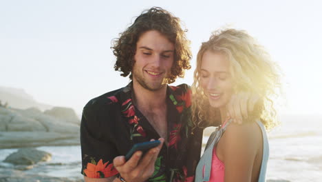 Selfie,-phone-and-happy-couple-at-the-beach