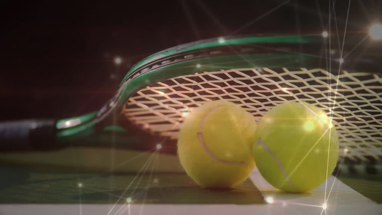 Animated illustration of tennis racket head resting on court, balls nestling, lens flares floating