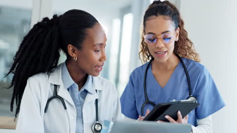 doctors, women and teamwork on tablet for medical