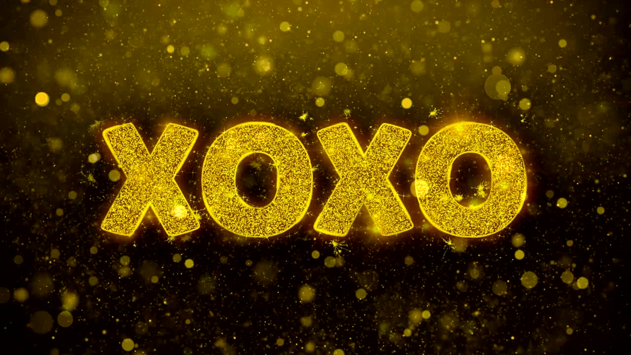 황금 반이는 반이는 입자 애니메이션에 xo 텍스트.