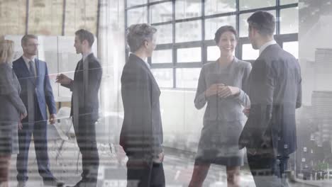 Animation-of-diverse-coworkers-having-conversation-in-office-on-aerial-view-of-cityscape