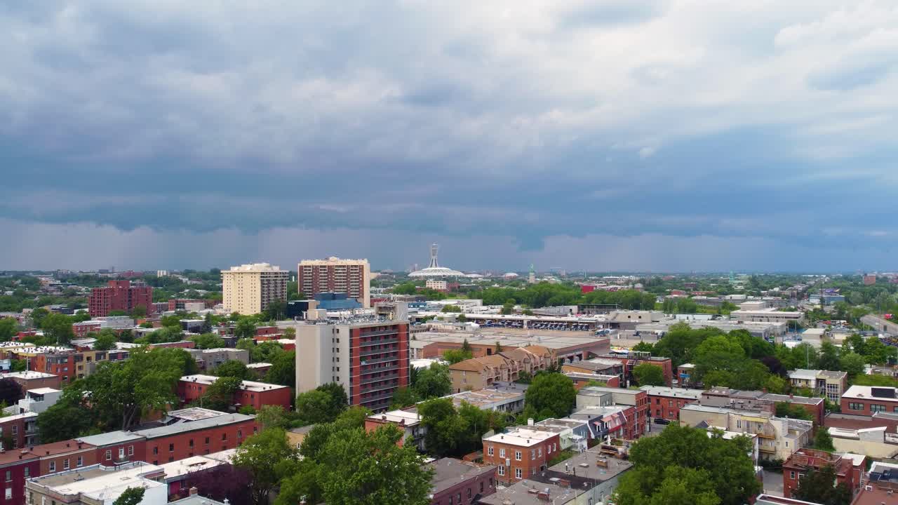 Aerial View of Montreal Neighborhood Under Stormy Clouds