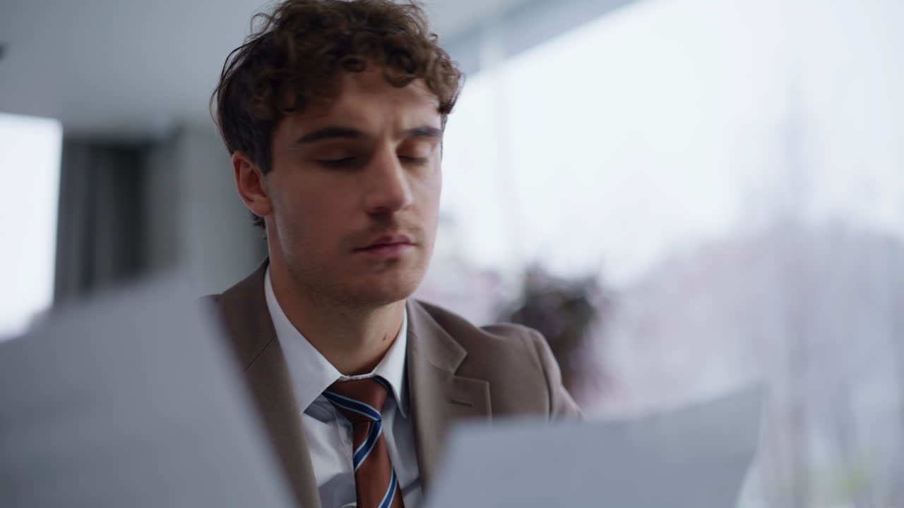 Fingers texting email laptop keyboard at panoramic apartment office closeup