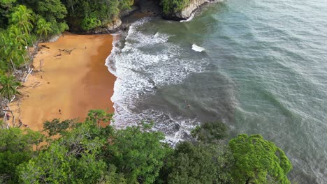 aerial of remote golden beach in the pacific ocean of colombia