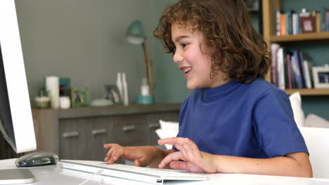 -Happy-son-using-computer