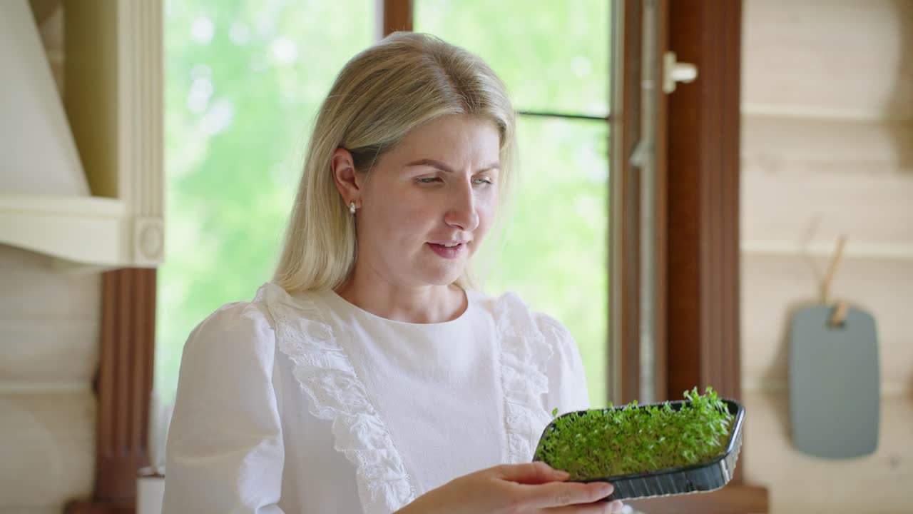 Woman in Kitchen with Microgreens