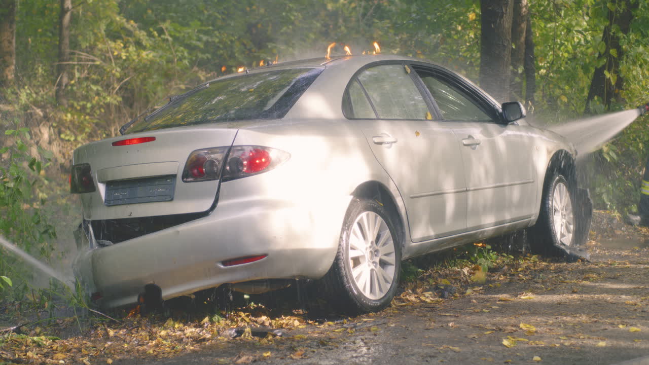 Burning Car Extinguished by Firefighters