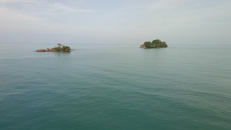 Aerial-drone-dolly-shot-approaching-deserted-tropical-islands