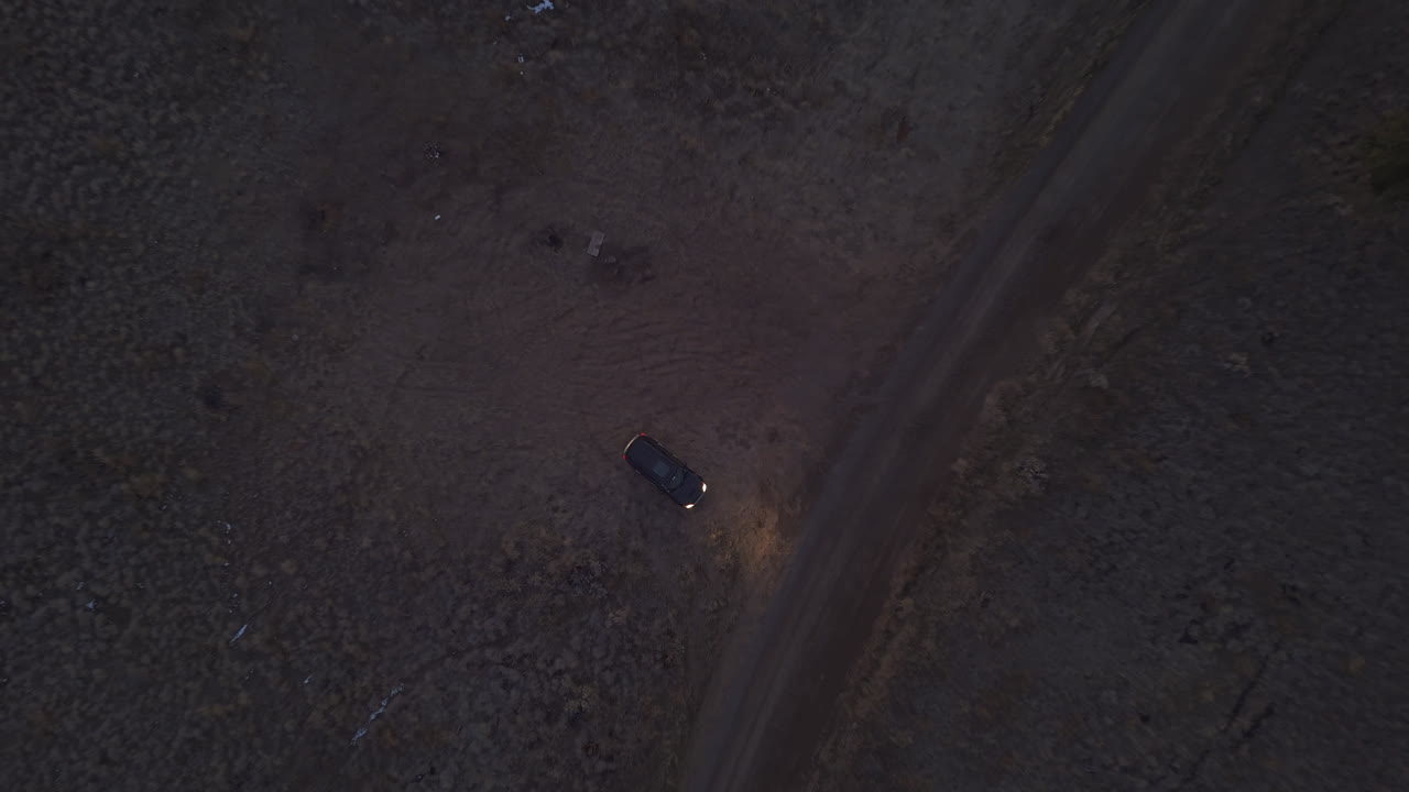 Birds Eye View of a single car in Lac Du bois Crasslands in Kamloops
