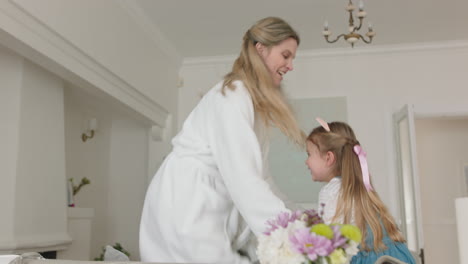 happy mother and daughter jumping on sofa little girl playing game with mom enjoying fun weekend together 4k footage