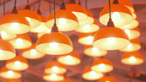 vintage lamps hang and glow indoors at night