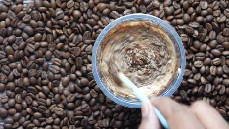 mixing iced coffee drink