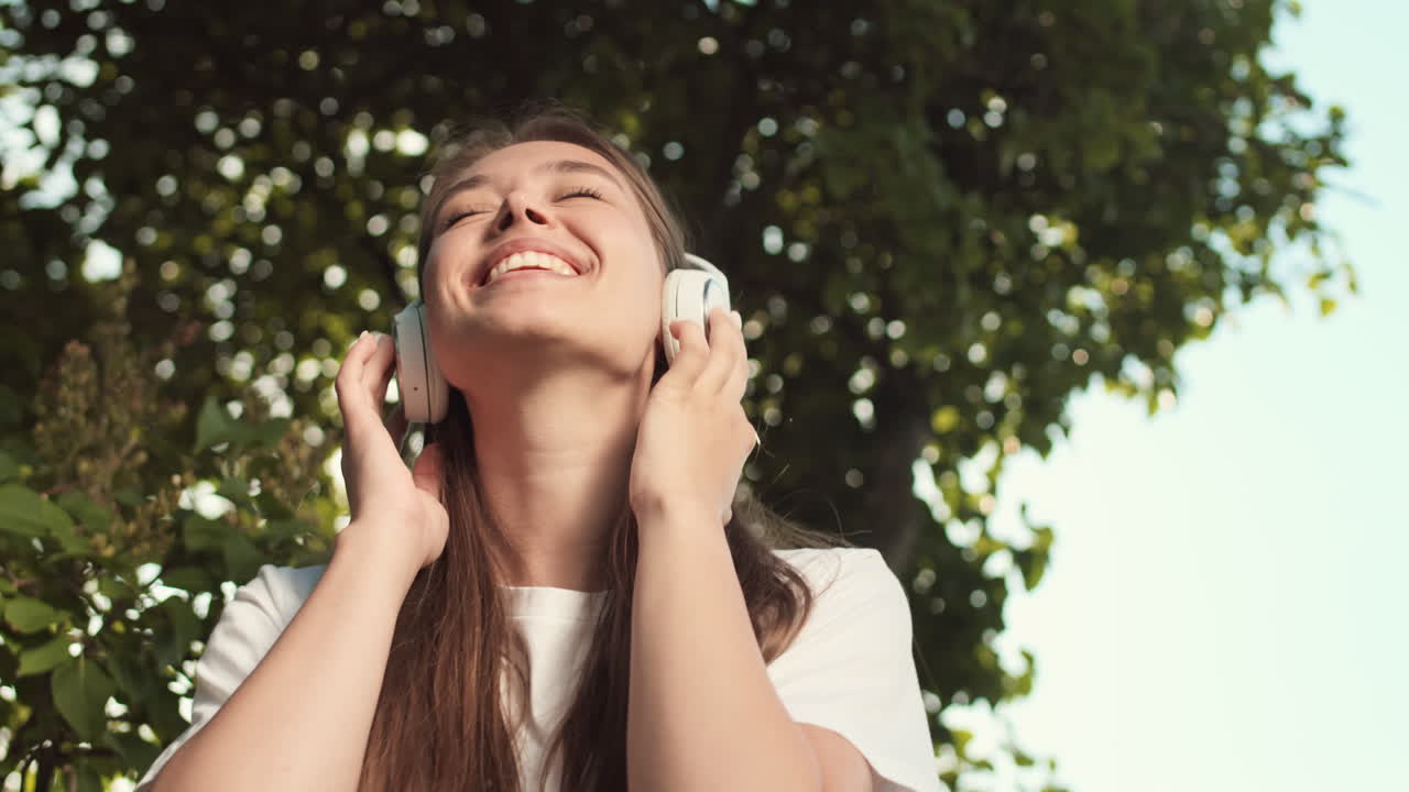 Joyful Woman Listening to Music